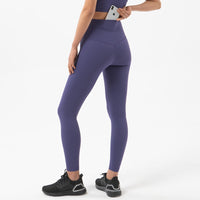 Legging gainant yoga violet vue de derrière
