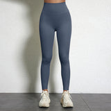 Legging Drainant Anti Cellulite gris bleu porté, conçu pour réduire la cellulite avec confort optimal et style moderne.