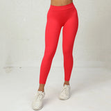 Legging Bresilien Anti Cellulite rouge porté, confortable, élastique et effet amincissant pour une silhouette parfaite.
