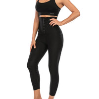 Legging de Sudation Anti Cellulite noir taille haute, conçu pour affiner la silhouette et lutter contre la cellulite.