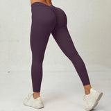 Legging Bresilien Anti Cellulite violet sculptant, confortable et effet amincissant parfait pour toutes activités.