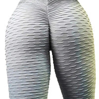 Legging Anti Cellulite France gris texturé mettant en valeur les courbes et réduisant l’apparence de la cellulite.