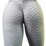 Legging Anti Cellulite France gris texturé mettant en valeur les courbes et réduisant l’apparence de la cellulite.