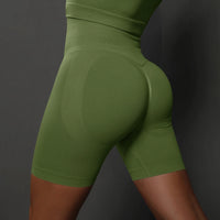 Legging Cycliste Gainant Femme vert kaki avec effet sculptant et taille haute pour un maintien et confort optimal.