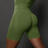 Legging Cycliste Gainant Femme vert kaki avec effet sculptant et taille haute pour un maintien et confort optimal.
