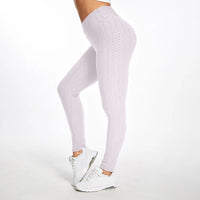 Legging Anti Cellulite XXL blanc texturé porté, silhouette affinée et maintien confortable pour sport et quotidien.
