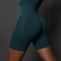 Legging Cycliste Gainant Femme en tissu gainant et extensible, sculptant la silhouette avec confort et maintien optimal.