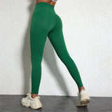 Legging Drainant Anti Cellulite vert porté, silhouette affinée et confort optimal pour activités sportives et quotidiennes.