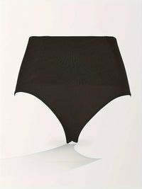 Gaine String Ventre Plat Pas Cher noire taille haute en polyamide, sculptant et invisible sous les vêtements.