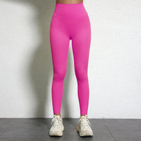 Legging Drainant Anti Cellulite rose fuchsia porté avec baskets, silhouette affinée et confort optimal.