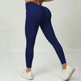 Legging Bresilien Anti Cellulite bleu marine porté, effet sculptant et confort optimal pour une silhouette affinée.