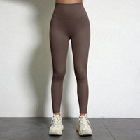 Legging Drainant Anti Cellulite marron, ajusté et confortable pour sport et quotidien, silhouette affinée et peau lisse.
