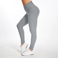 Legging Anti Cellulite XXL gris texturé porté, offrant maintien, confort et effet amincissant pour toutes morphologies.