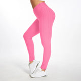 Legging Anti Cellulite XXL rose porté, textile texturé sculptant et amincissant la silhouette.