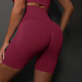 Legging Cycliste Gainant Femme bordeaux sculptant et confortable avec taille haute pour un maintien optimal.