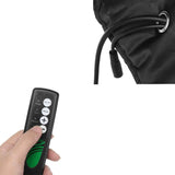 Gros plan sur la télécommande de la ceinture vibrante