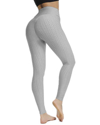 Femme qui porte un legging anti cellulite drainant