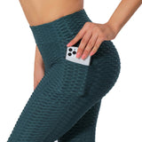 Legging court anti cellulite femme vert foncé de profil