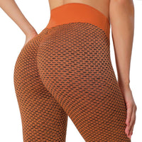 Legging massant anti cellulite orange