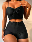 Femme qui porte un Maillot de Bain Gainant deux Pièces Taille Haute noir