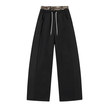 Pantalon large noir taille haute avec ceinture léopard 6