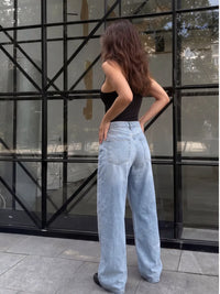 Jean large droit délavé troué à boutons 3