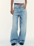Jean large droit délavé troué à boutons 5