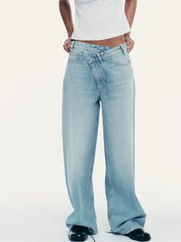 Jean large droit délavé troué à boutons 9