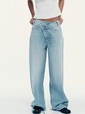 Jean large droit délavé troué à boutons 9