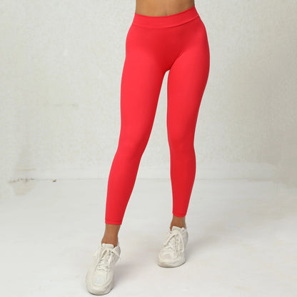 Legging Bresilien Anti Cellulite rouge porté, confortable, élastique et effet amincissant pour une silhouette parfaite.