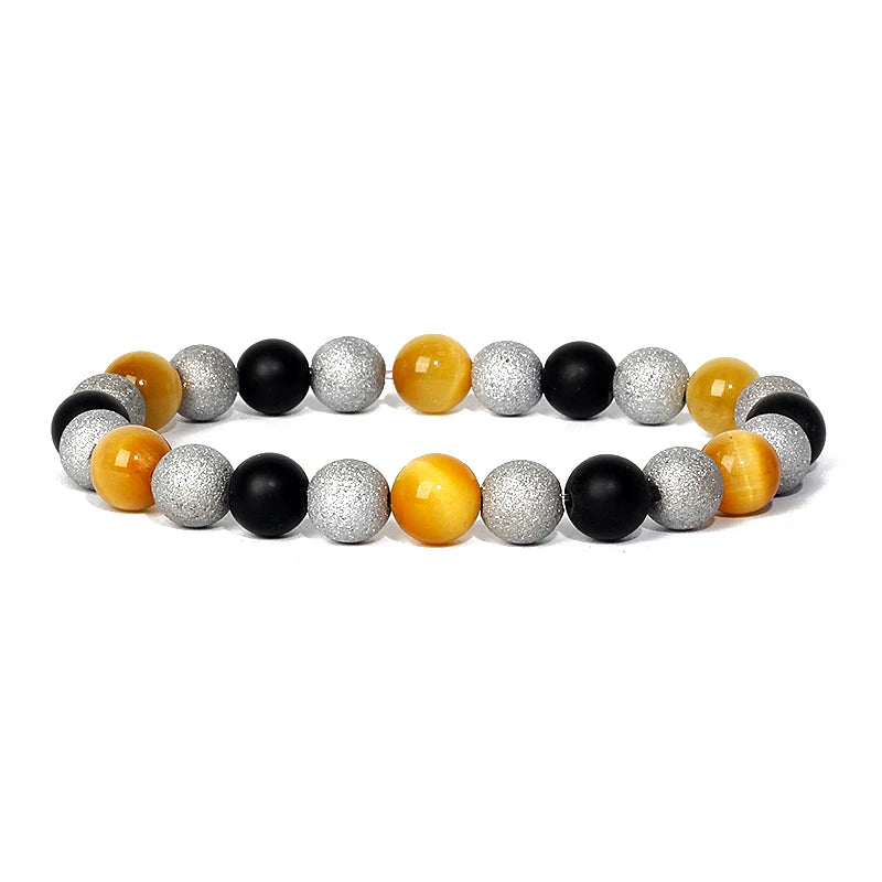 Bracelet magnetique pour maigrir homme avec perles argentees, noires et jaunes elegamment disposees en alternance