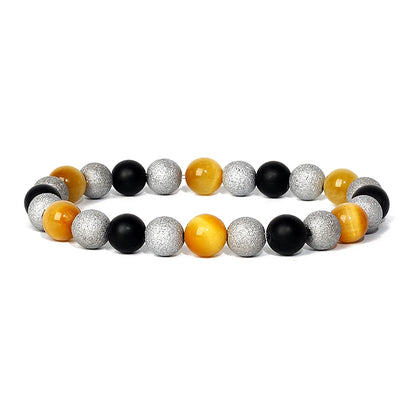 Bracelet magnetique pour maigrir homme avec perles argentees, noires et jaunes elegamment disposees en alternance
