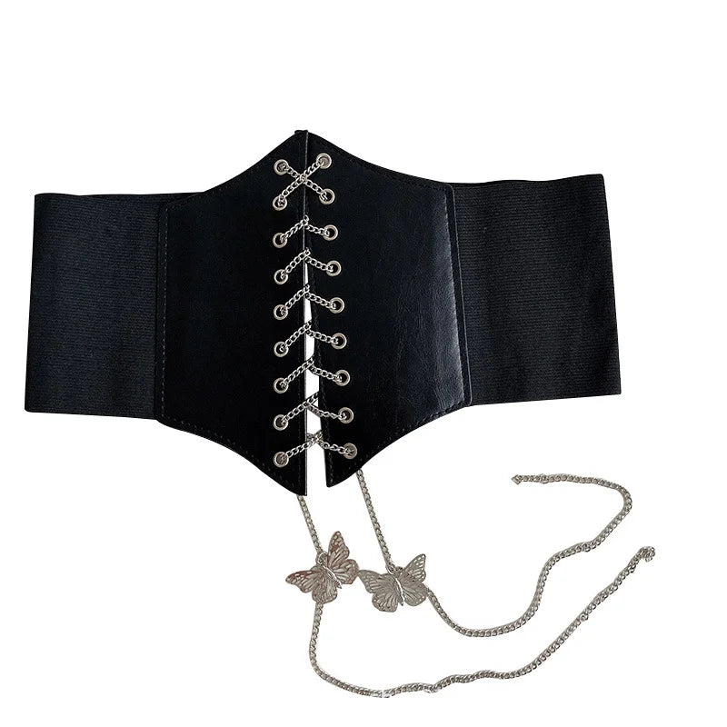 Corset Papillon en simili cuir noir avec laçage central et chaine décorative papillon pour un style élégant et féminin.