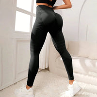Legging 3D Anti Cellulite Amincissant noir porté, effet gainant et sculptant pour une silhouette affinée et tonique.
