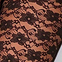 Legging Effet Collant Transparent avec motif floral délicat sur tissu transparent pour un style élégant et sophistiqué.
