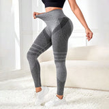 Legging 3D Anti Cellulite Amincissant gris avec design sculptant, tissu extensible et effet gainant pour silhouette affinée.