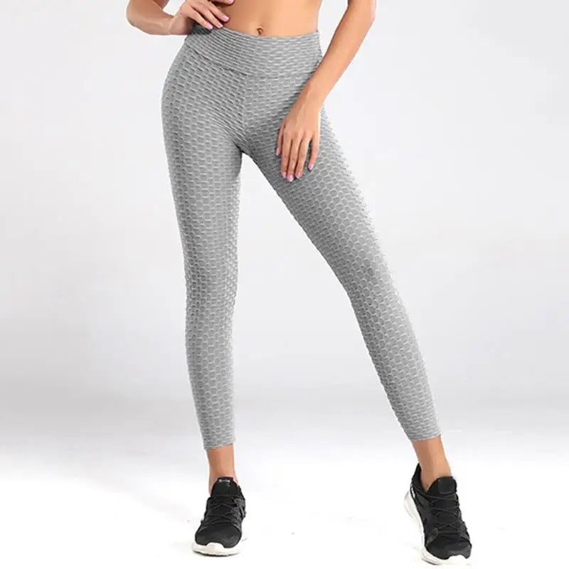 Legging Anti Cellulite France gris texturé porté, soulignant les courbes avec confort et effet sculptant.