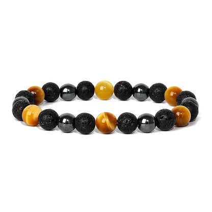 Bracelet magnetique amincissant avec perles en oeil de tigre, hematite et pierre de lave noire sur fond blanc
