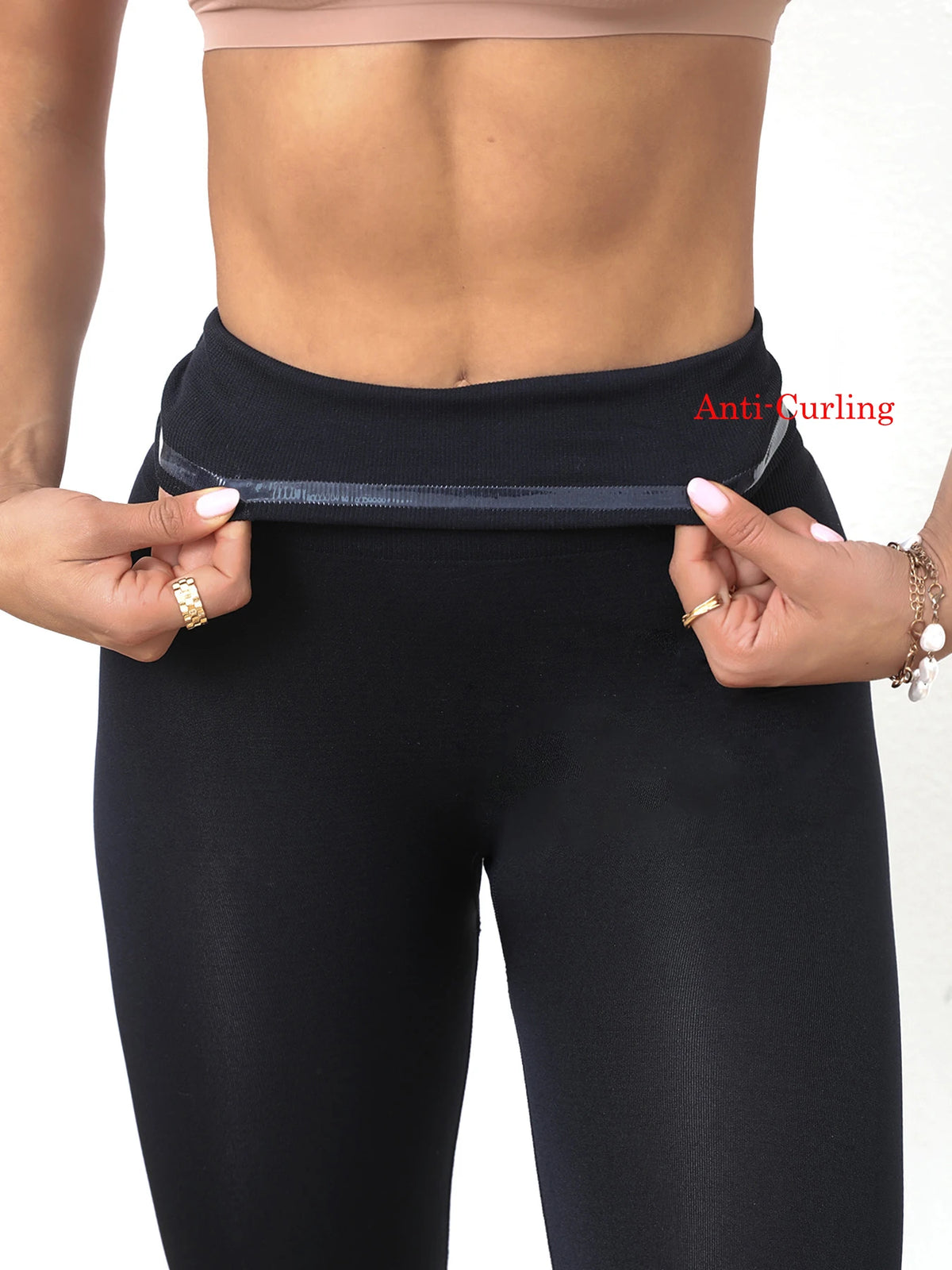 Legging de Compression Anti Cellulite noir, taille haute avec technologie anti curling pour un maintien optimal et silhouette affinée.