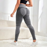 Legging 3D Anti Cellulite Amincissant gris avec design gainant mettant en valeur la silhouette et galbant les fesses.