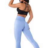 Femme qui porte un legging gainant de danse violet clair