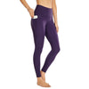 Femme qui porte un Legging gainant taille haute fitness violet